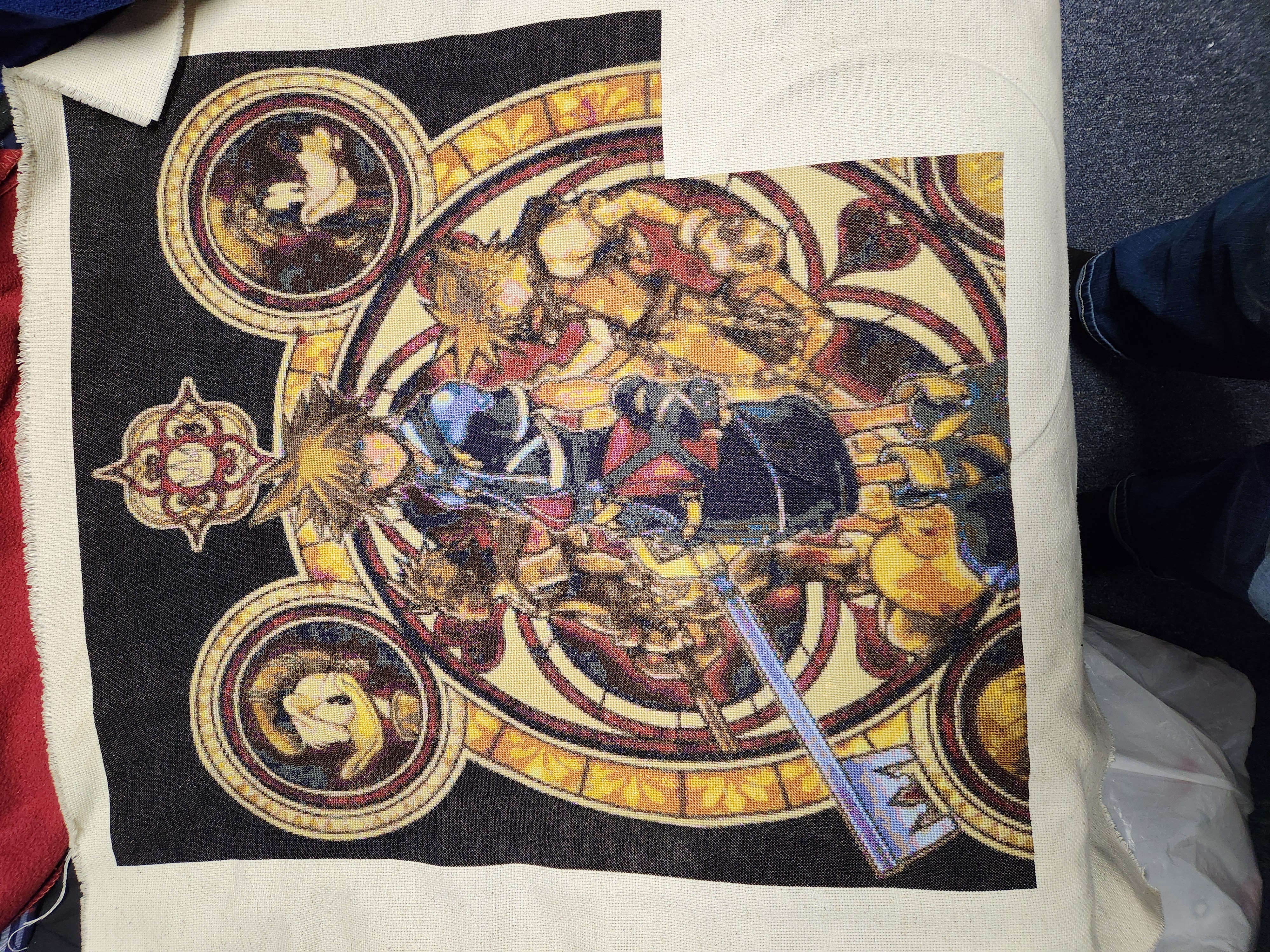 An unfinished cross stitch project featuring Sora, the main character of the Kingdom Hearts series.